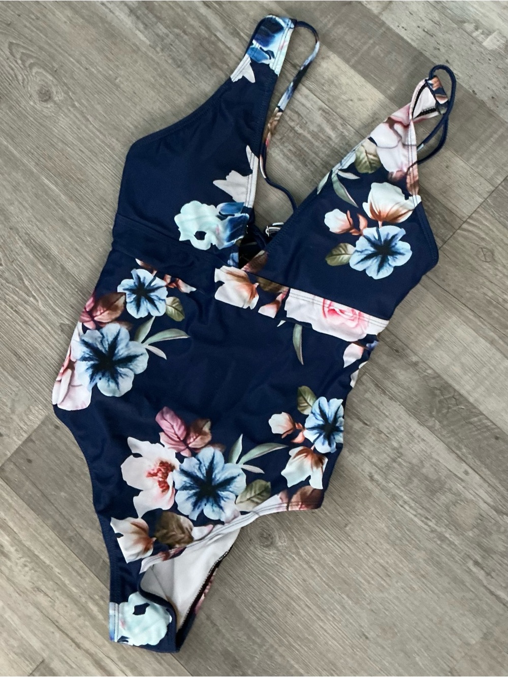 Veceney One Piece Swimsuit featuring a blue floral print and a high-cut design